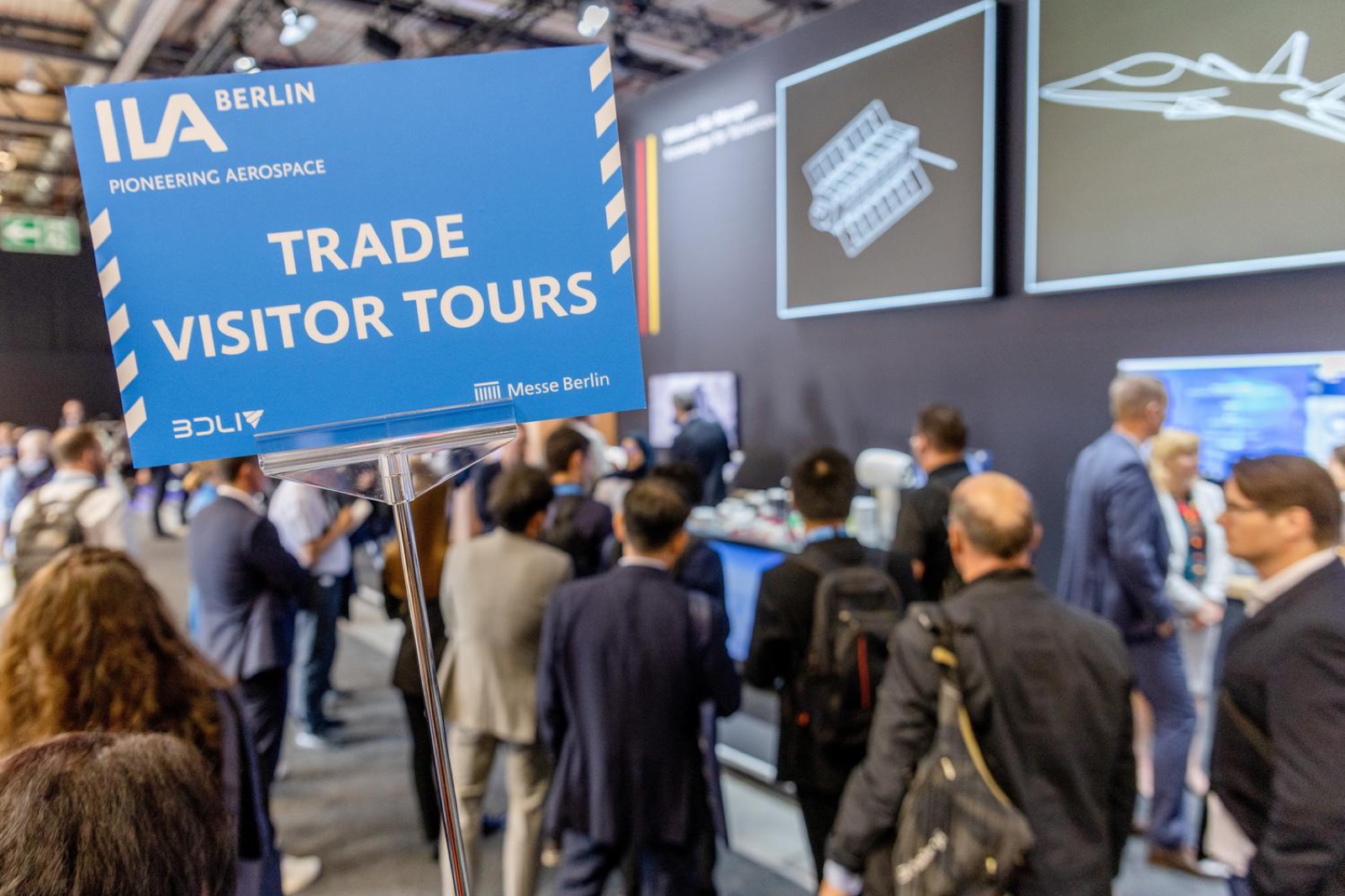 Meeting point at the TRADE VISITOR TOURS sign on ILA Plaza